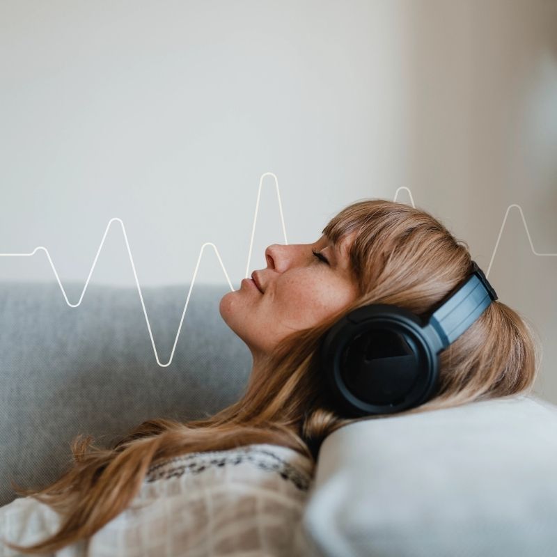Two people lying close together after participating in sex therapy together.
